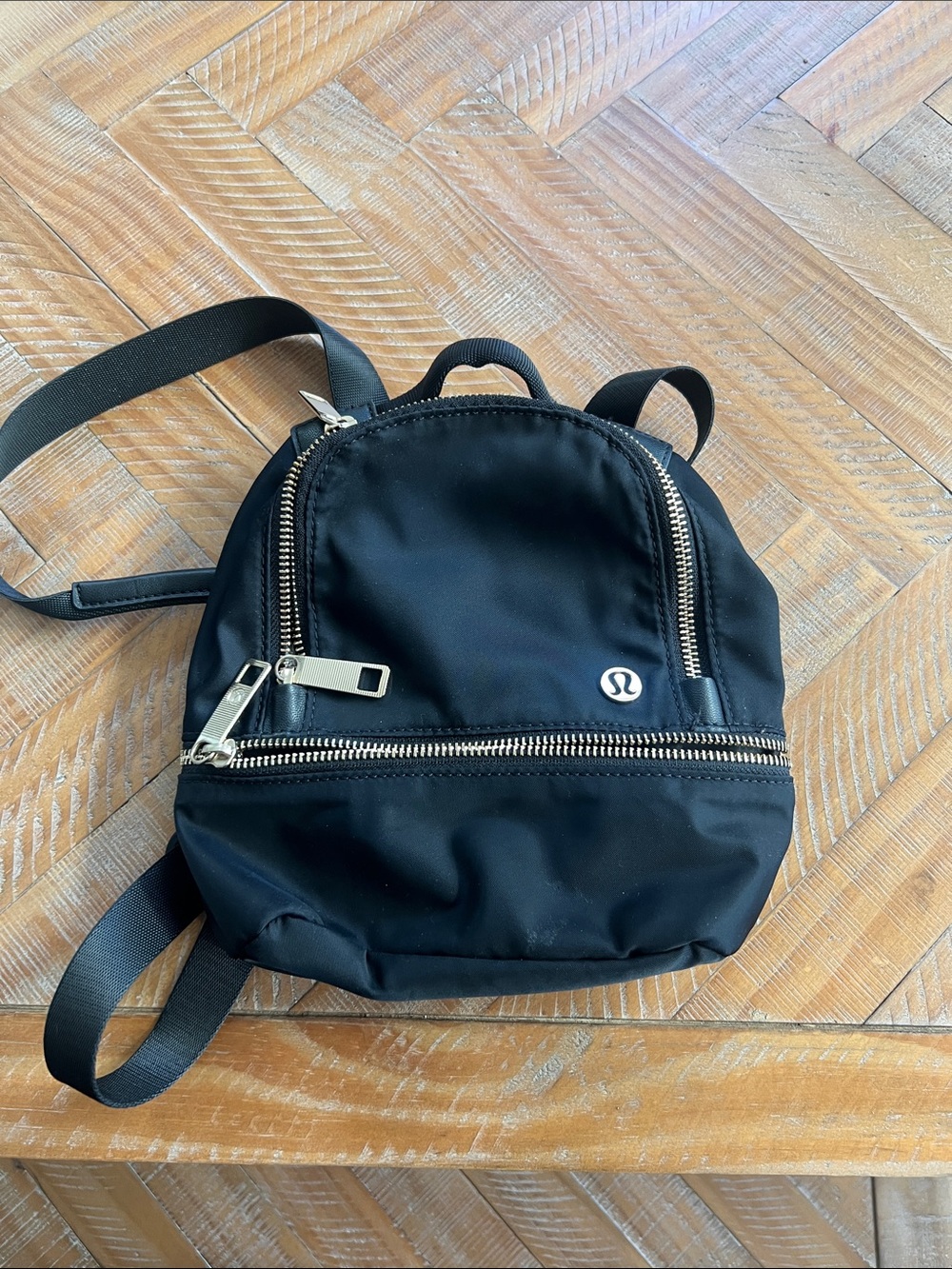 lululemon athletica Black Mini Backpack with Silver Zippers